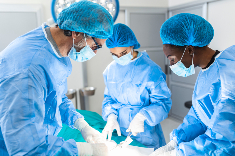 Group,Of,Surgeons,Doing,Surgery,In,Hospital,Operating,Theater.,Medical